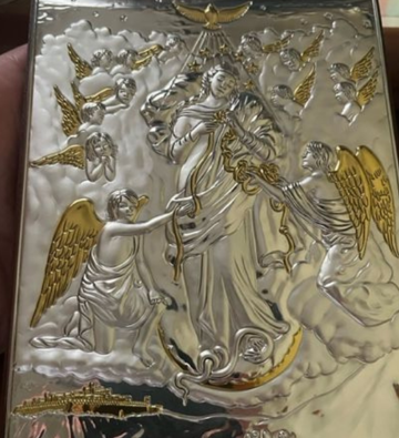 A silver image of 'Mary Untier of Knots', blessed by Pope Francis for prisoners in England and Wales